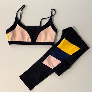 P.E Nation Black, Pink, and Yellow Sports Bra and Leggings Set
